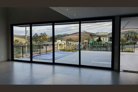 3_photo/00a6a2ca0d.23351eba74f1df34-ATLAS-c28cc881-b622-474a-b993-76f65b02e86d.jpg de casa à venda com 4 quartos, 394m² em Estancia Del Rey, Nova Lima