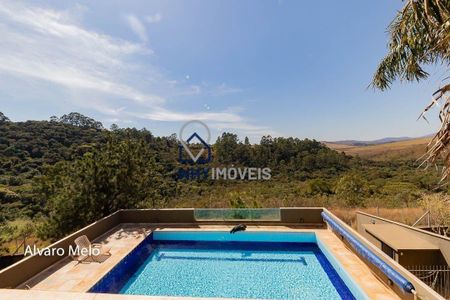 11_photo/00a6ba5215.80a7f3f1b00bd23a-ATLAS-53da1606-da0f-4934-ba2a-3c26e3ea9ce1.jpg de casa à venda com 6 quartos, 550m² em Condomínio Retiro das Pedras, Nova Lima