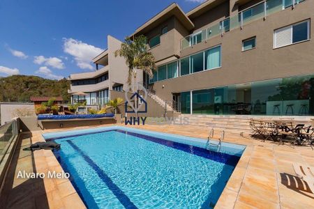 10_photo/00a6ba5215.80a7f3f1b00bd23a-ATLAS-662fef4a-efd3-49d3-afce-88df2278cf5a.jpg de casa à venda com 6 quartos, 550m² em Condomínio Retiro das Pedras, Nova Lima