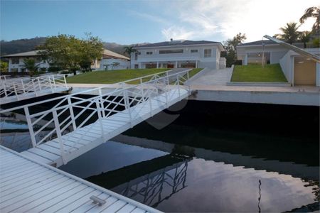 43_photo/94cdfe2a13.4b5f5827c7f3d090-ATLAS-0afc27a6-a79d-4f28-8a67-5d945a4da699.jpg de casa à venda com 10 quartos, 1000m² em Cidade Jardim Tom, Guarujá