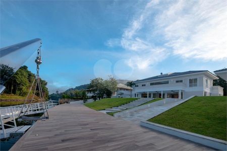 42_photo/94cdfe2a13.4b5f5827c7f3d090-ATLAS-63684ab7-bcd8-43bf-a189-13aa86c3f657.jpg de casa à venda com 10 quartos, 1000m² em Cidade Jardim Tom, Guarujá