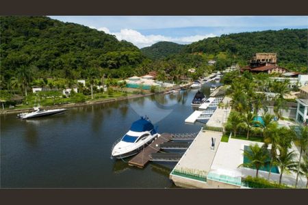 11_photo/94cdfe2a13.4b5f5827c7f3d090-ATLAS-7ba7679b-fb8b-4fb2-b2d3-c7a0ee05d38a.jpg de casa à venda com 10 quartos, 1000m² em Cidade Jardim Tom, Guarujá