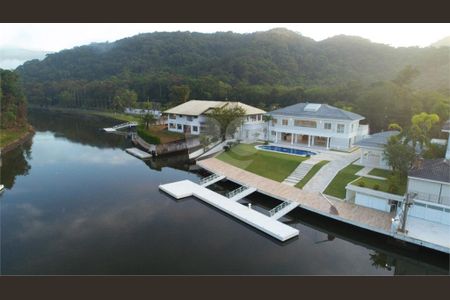 5_photo/94cdfe2a13.4b5f5827c7f3d090-ATLAS-b785bfa1-a76e-431d-a90e-fac80869986c.jpg de casa à venda com 10 quartos, 1000m² em Cidade Jardim Tom, Guarujá