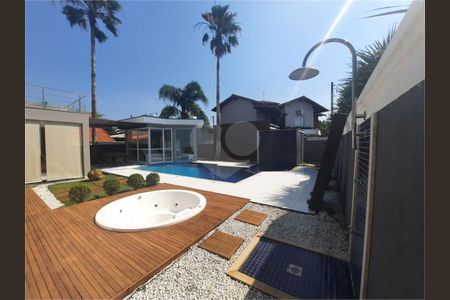 5_photo/94cdff94b5.342cb89e52c6f9ad-ATLAS-12c2f412-e0ce-4327-9fbf-1994951fb2a7.jpg de casa à venda com 5 quartos, 480m² em Jardim Acapulco, Guarujá