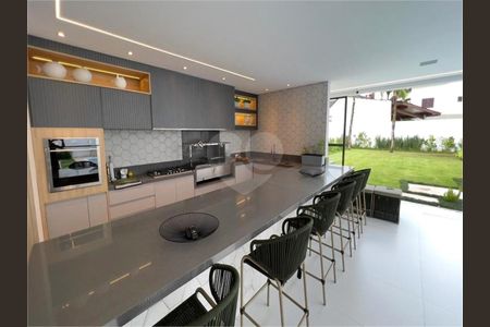 5_photo/94cdffec27.fff6d191bb96d373-ATLAS-48f7bcb7-1f56-41c7-bc8e-52ba9bf506a0.jpg de casa à venda com 7 quartos, 850m² em Jardim Acapulco, Guarujá