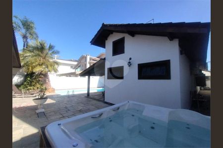 5_photo/94cdffefc1.4fc856360cf0b3d0-ATLAS-0ec5ffec-43db-43c4-b3e8-9b1ca65603cb.jpg de casa à venda com 4 quartos, 490m² em Jardim Acapulco, Guarujá