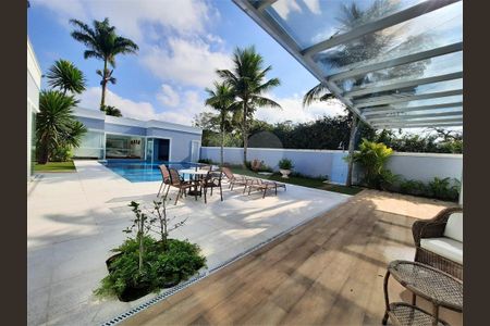 10_photo/94cdfff145.007d8801227075bf-ATLAS-42b109ff-5042-49cd-8bd4-e5e3a4ccedbe.jpg de casa à venda com 5 quartos, 750m² em Jardim Acapulco, Guarujá