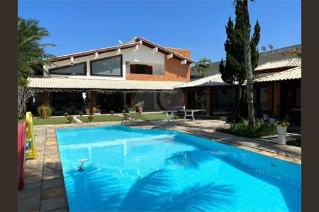 7_photo/94cdfff1c5.b88c9f23dde11cca-ATLAS-4da07171-238a-41bd-ab97-85614cdc772f.jpg de casa de condomínio à venda com 4 quartos, 500m² em Jardim Acapulco, Guarujá