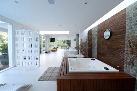 4_photo/94cdfffb07.e9bc35269128f7e8-ATLAS-cffa9d1f-f559-4e57-a323-9c6f53bd5a63.jpg de casa à venda com 8 quartos, 1122m² em Jardim Acapulco, Guarujá