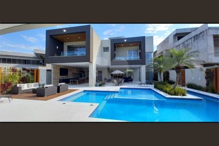 8_photo/94cdfffbd9.3e1b4b7d4b39a1bc-ATLAS-825d45c7-3b07-44cf-9b96-91e151f89ac9.jpg de casa à venda com 7 quartos, 900m² em Jardim Acapulco, Guarujá