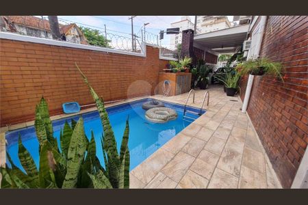 7_photo/94ce02460b.1c5ee5b12bdcf8f7-ATLAS-018863ac-c834-40e6-abd3-69a09e196c2a.jpg de casa à venda com 4 quartos, 187m² em Aparecida, Santos