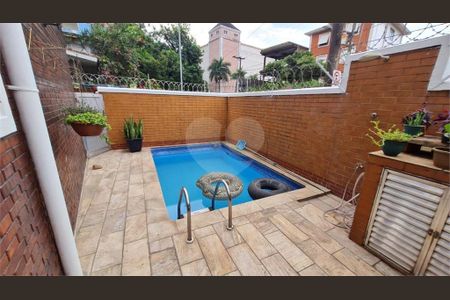 4_photo/94ce02460b.1c5ee5b12bdcf8f7-ATLAS-fed21b4a-61b3-4e19-9ee6-224f6f5203fe.jpg de casa à venda com 4 quartos, 187m² em Aparecida, Santos