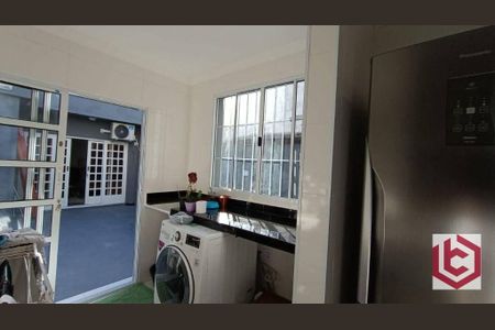 12_photo/94ce024e21.d1325d9d06f328eb-ATLAS-048767a9-60da-4639-abd8-a044ecb43efc.jpg de casa à venda com 3 quartos, 200m² em Embaré, Santos