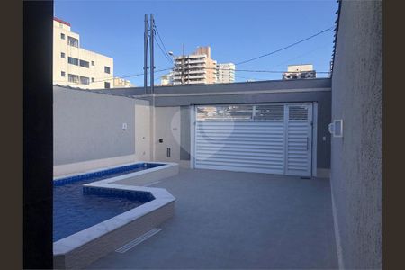 4_photo/94ce1ef5fb.72f38772c60cc7a0-ATLAS-65e06b5e-e941-4c0a-acb5-2bb8638778b8.jpg de casa à venda com 3 quartos, 135m² em Vila Tupi, Praia Grande