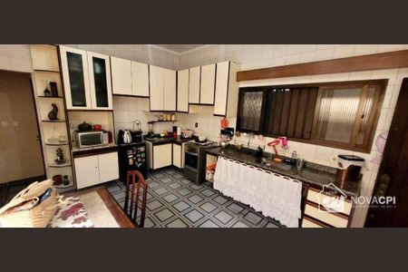 5_photo/94ce1efc3b.1434eac05e667b5e-ATLAS-58193de1-3b79-4857-b6d7-23ee4e3d352f.jpg de casa à venda com 4 quartos, 220m² em Vila Assuncao, Praia Grande