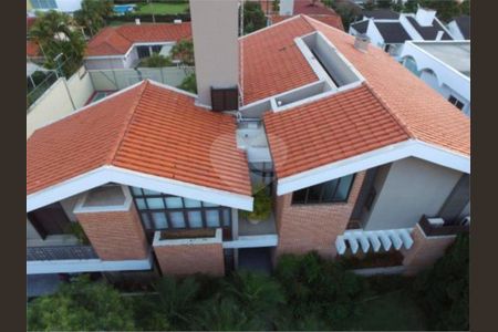 1_photo/94cf02151b.e6f02a1e96aef2b1-ATLAS-bf0fff03-452c-4eac-b938-9769dc052584.jpg de casa de condomínio para alugar com 5 quartos, 900m² em Alphaville Residencial Um, Barueri