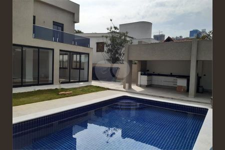 18_photo/94cf023115.014d739fb69e46b1-ATLAS-bfc0a7c5-7d22-4a09-955e-ef6e7de1f60c.jpg de casa de condomínio à venda com 4 quartos, 330m² em Jardim Paulista, Barueri