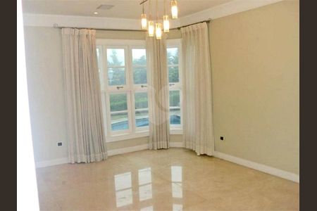 9_photo/94cf051965.fd4e69175d3a2864-ATLAS-d5a013cc-7ce6-4e3c-9b34-e548dbeb1f8b.jpg de casa à venda com 5 quartos, 560m² em Residencial Morada dos Lagos, Barueri