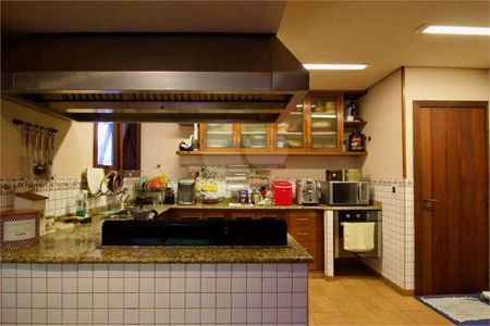 18_photo/94cf056c95.e1d2c46bde3eb79c-ATLAS-a54f67cd-c47d-4ae7-9359-04d34717238c.jpg de casa à venda com 7 quartos, 628m² em Aldeia da Serra, Barueri