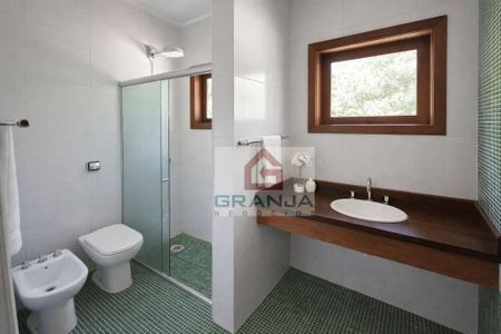 4_photo/94cfaaaef3.589418af3e1c9350-ATLAS-6bf2afc0-d911-4027-ae41-b38b594b835d.jpg de casa à venda com 4 quartos, 409m² em Granja Viana, Cotia