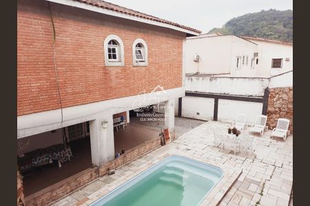 8_photo/94d1fe1d0f.f469cfda097b0aa9-ATLAS-570be638-0501-42f8-a59a-11c4f9fe3d3a.jpg de casa à venda com 6 quartos, 297m² em Vila Santa Rosa, Guarujá