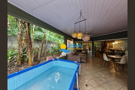 3_photo/94d1fe74d3.a095ebe9a9b9d05b-ATLAS-1181615c-85f7-4a0c-a2e9-8aefc52fac4c.jpg de casa à venda com 4 quartos, 202m² em Jardim Guaiuba, Guarujá