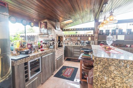 12_photo/94dce0455f.8d27b9fcb1abea0f-ATLAS-27eca3f4-dbae-4e1a-ae61-0c85a4fd0f1e.jpg de casa à venda com 4 quartos, 420m² em Santa Felicidade, Curitiba