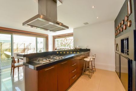 2_photo/94dce3b4c9.ceff8192393c33de-ATLAS-e9fc4fe8-772b-4e2a-b433-2549e4c6e8f4.jpg de casa à venda com 4 quartos, 476m² em Campo Comprido, Curitiba