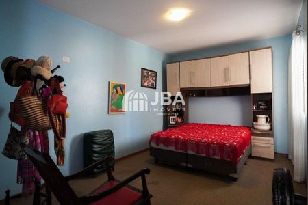 12_photo/94dce5a839.c202053c0eb79174-ATLAS-bd7fc7ea-7183-4da5-9f27-6fd1f661e180.jpg de casa à venda com 4 quartos, 187m² em Cristo Rei, Curitiba