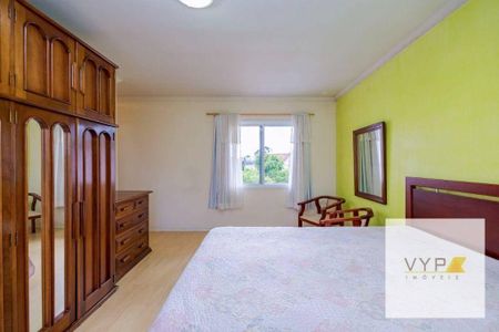 2_photo/94dce5c179.2121f4c72a2ba616-ATLAS-baff99e8-a42b-47ef-99fa-36d4549efd63.jpg de casa à venda com 4 quartos, 345m² em Bacacheri, Curitiba