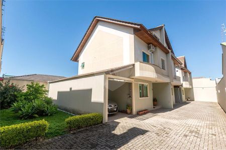 2_photo/94dce5d1c9.6bc6d6e3d41508d6-ATLAS-53e1fec5-7821-4de1-be7a-2fd0dccb0b80.jpg de casa à venda com 4 quartos, 150m² em Bacacheri, Curitiba