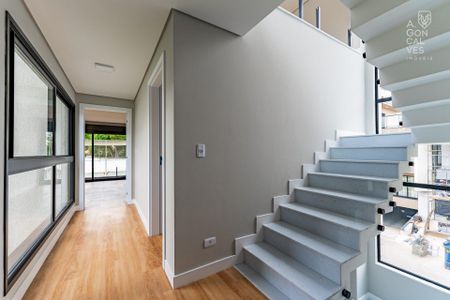 11_photo/94dce6fc05.ee367967f886cb7c-ATLAS-b79c6c67-c176-4401-a78f-b2964e323bd3.jpg de casa à venda com 3 quartos, 243m² em Santa Cândida, Curitiba