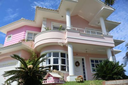 4_photo/952725cdb1.cba9474eaf1c4fd4-ATLAS-c56cbee3-0d4e-4c45-aa0d-576f0de9033d.jpg de casa à venda com 5 quartos, 390m² em Pântano do Sul, Florianópolis