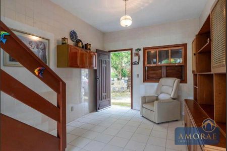 12_photo/952725df0f.ae3b18c23d5eb7a5-ATLAS-da4ef3f4-32a3-4b22-840a-2c23252bb567.jpg de casa à venda com 4 quartos, 280m² em Praia Acores, Florianópolis