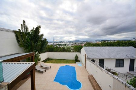 12_photo/952737c639.1e9d1ba85beb8478-ATLAS-cd1e9b96-e5a5-4014-8c9a-e40e3b991790.jpg de casa à venda com 3 quartos, 312m² em Capoeiras, Florianópolis