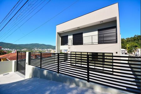 36_photo/9527385a57.90bd9ce7e18c11b8-ATLAS-8f84e978-3d5a-4837-bb72-1e60b3fd5630.jpg de casa à venda com 3 quartos, 164m² em Trindade, Florianópolis