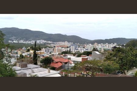 4_photo/9527385b31.638b34ff0fe22444-ATLAS-29a76c7b-7ac8-46d3-8bc8-1069a6608613.jpg de casa à venda com 4 quartos, 280m² em Trindade, Florianópolis