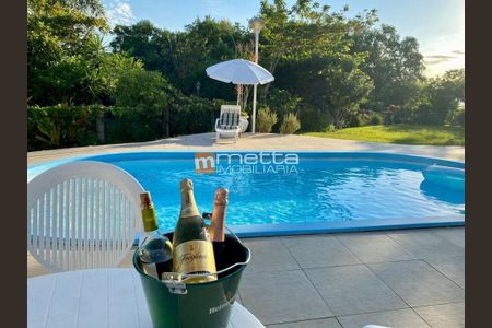 12_photo/95273887ad.5b63f18bcccc212e-ATLAS-b6bc4843-00a8-4f27-a92a-0e5d106f0a70.jpg de casa à venda com 3 quartos, 430m² em Saco Grande, Florianópolis