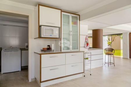 11_photo/952738df9f.42fc04046762a4be-ATLAS-3d38f5a8-5ee8-4edf-8e3d-eccfcb7b473f.jpg de casa à venda com 5 quartos, 320m² em Itacorubi, Florianópolis