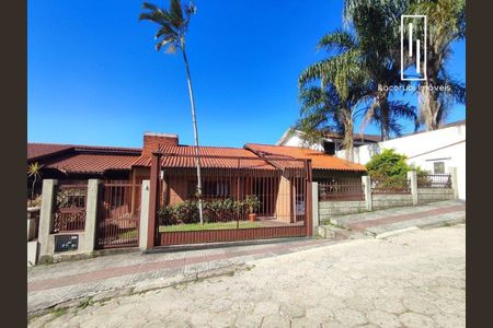 2_photo/9527390837.04f4efb4ec0e2ec3-ATLAS-60ca54aa-cd87-4945-9471-6fe8e55b0af8.jpg de casa à venda com 4 quartos, 213m² em Pantanal, Florianópolis