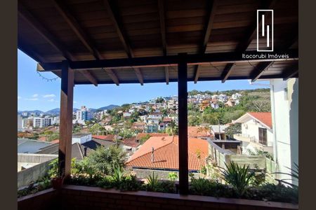 3_photo/9527390837.04f4efb4ec0e2ec3-ATLAS-de6ac36a-49d6-46be-b7b9-fead4e2137a4.jpg de casa à venda com 4 quartos, 213m² em Pantanal, Florianópolis