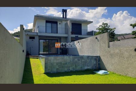 17_photo/95273918c5.a824f5d462c04ebd-ATLAS-3ce4fe63-455b-4e1b-98b4-00d3b5342550.jpg de casa à venda com 4 quartos, 240m² em Itacorubi, Florianópolis