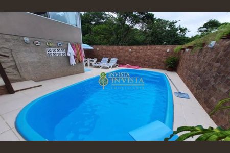 8_photo/95273924bb.9d8fed69801cdea0-ATLAS-43bafebe-e718-49d6-b18f-03f30bc3e898.jpg de casa à venda com 2 quartos, 70m² em Itacorubi, Florianópolis