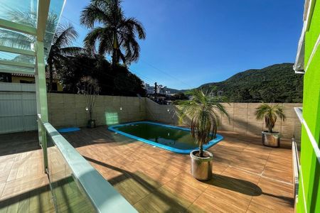 27_photo/95273924c7.0176ad22bcbf6d3f-ATLAS-0889beba-3b0c-464e-9d5f-7e5e6e432b21.jpg de casa à venda com 4 quartos, 221m² em Itacorubi, Florianópolis