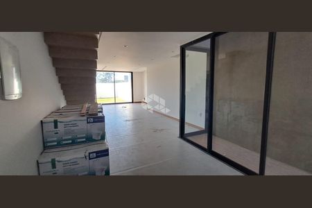 8_photo/95273a2dbd.b7a28b76476596d7-ATLAS-314973e6-a2c7-4430-a767-8f457cea8816.jpg de casa à venda com 3 quartos, 163m² em Carianos, Florianópolis