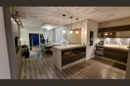 10_photo/95273a4357.0e5883cd31689f99-ATLAS-e5b51818-8076-4b4b-8d4f-86c1fee6cd5c.jpg de casa à venda com 3 quartos, 196m² em Carianos, Florianópolis