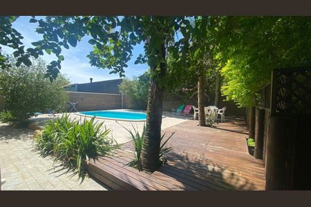 17_photo/95273a4f5d.671b3960e7484b54-ATLAS-7464aa09-1309-45ba-acef-ca0f60b39d2f.jpg de casa à venda com 4 quartos, 247m² em Carianos, Florianópolis