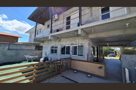 5_photo/95273a4f9d.58dbba0947eec603-ATLAS-8f44f095-ff62-4875-8d9b-cc97eda81e1d.jpg de casa à venda com 4 quartos, 110m² em Carianos, Florianópolis