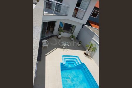 4_photo/95273a5ae9.bd2dffe6b68feeb7-ATLAS-e45626b7-60db-4f97-8d5c-a5ea786e2922.jpg de casa à venda com 4 quartos, 321m² em Carianos, Florianópolis