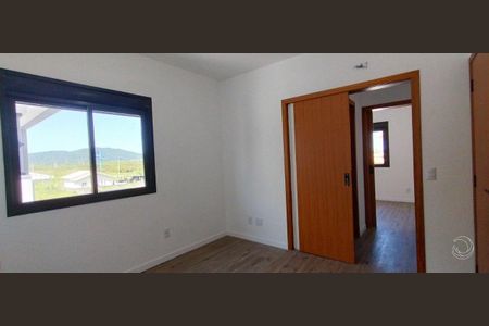 14_photo/95273a5ca9.8cbbc6e43ead3576-ATLAS-4dad5fc8-dbc0-4bde-860c-60b884fdde01.jpg de casa à venda com 3 quartos, 127m² em Carianos, Florianópolis